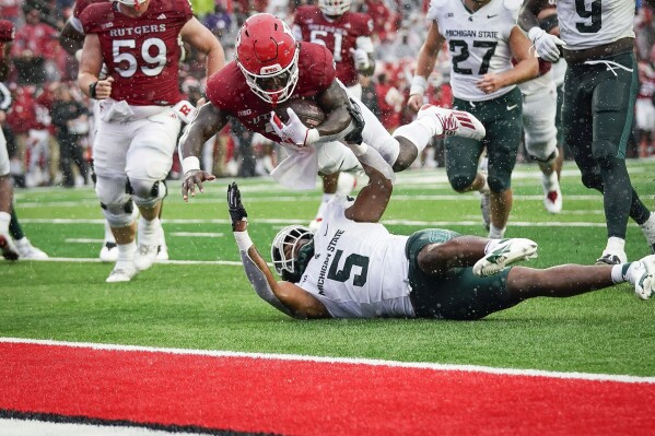Michigan state football score top